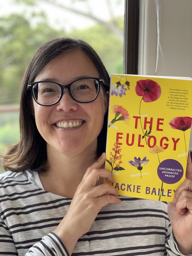 Jackie Bailey holding copy of The Eulogy ARC